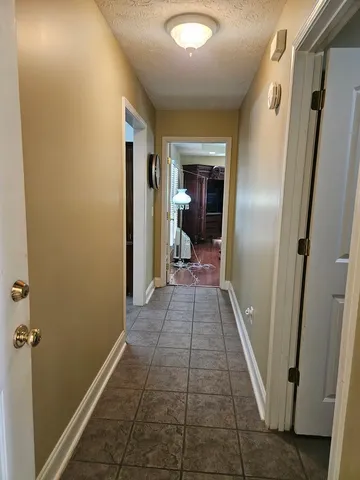 a living room with furniture fireplace and a flat screen tv