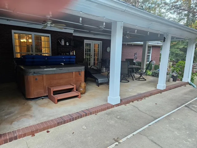a room with pool table and furniture