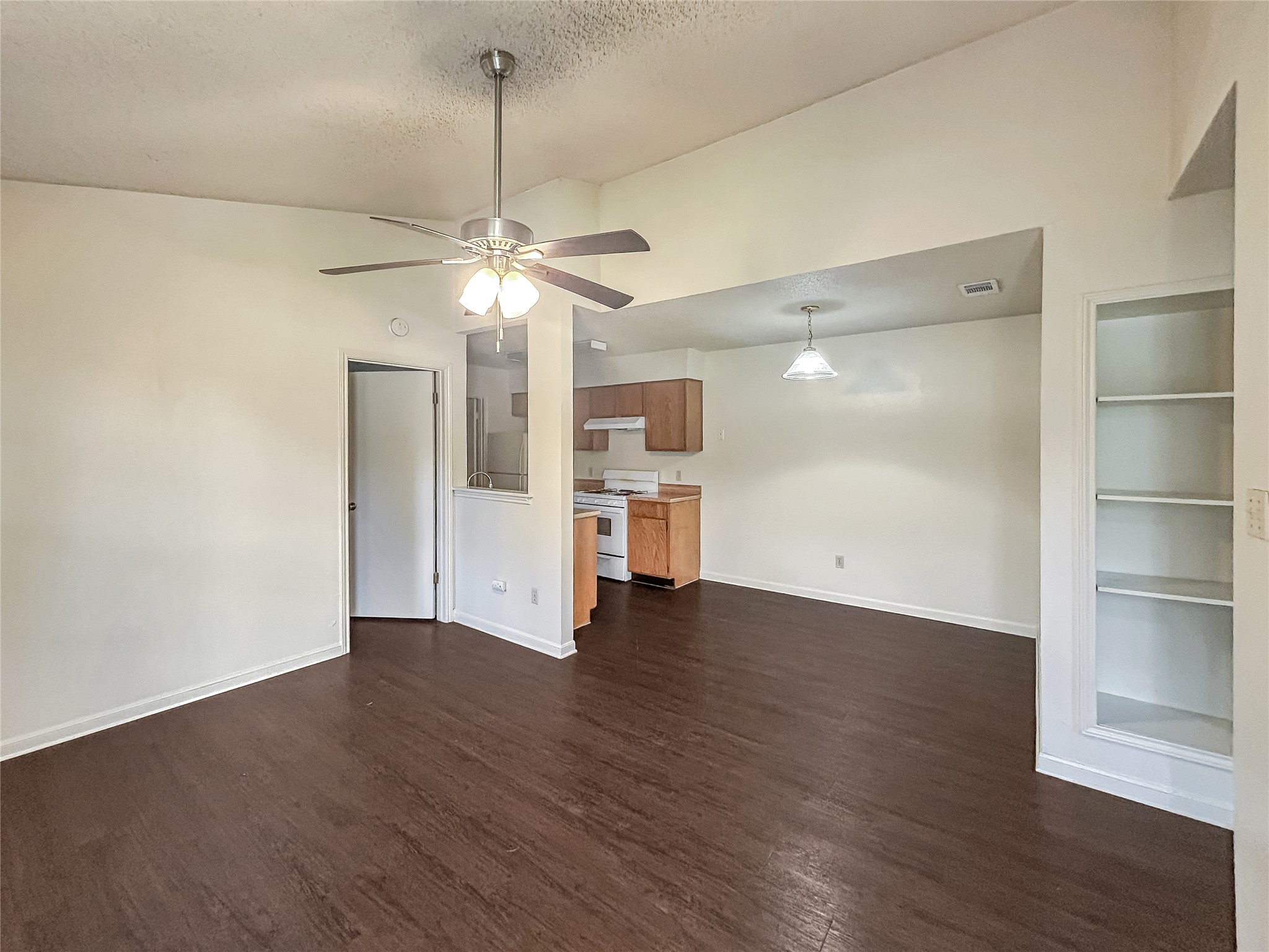 2008 Alex Avenue, Unit A Austin, TX 78728 - Photo 21 of 22 Open Floor Plan Living Room Leading to the Dinning Room and Kitchen