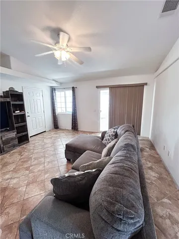 a stove top oven sitting inside of a kitchen