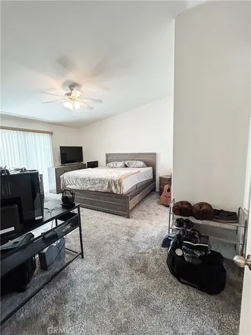 a bathroom with a sink toilet a mirror and vanity