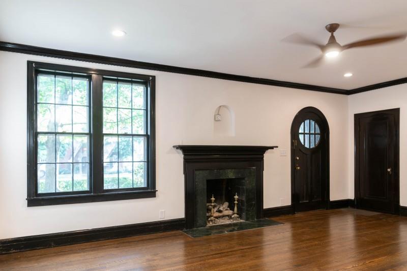 240 Cherokee Road Nashville, TN 37205 - Photo 2 of 22 a view of an empty room with wooden floor and a window