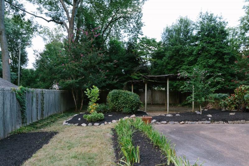 240 Cherokee Road Nashville, TN 37205 - Photo 21 of 22 a front view of a house with garden