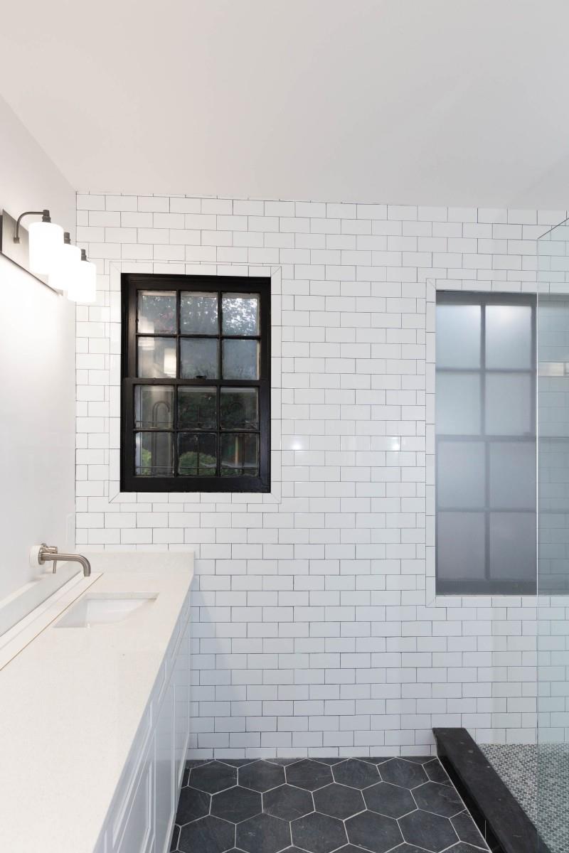 240 Cherokee Road Nashville, TN 37205 - Photo 8 of 22 a bathroom with a sink a mirror and shower