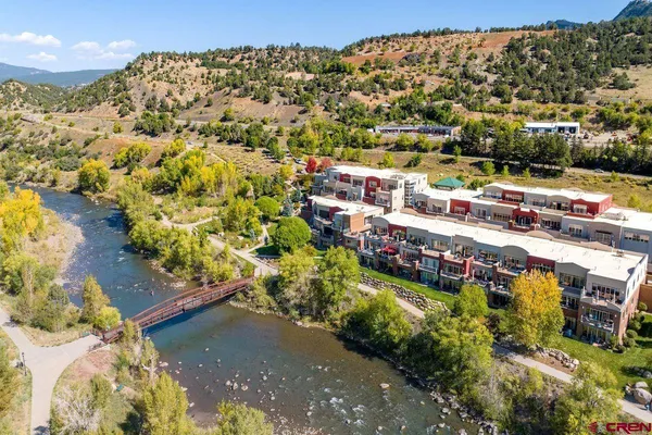 a view of balcony with furniture