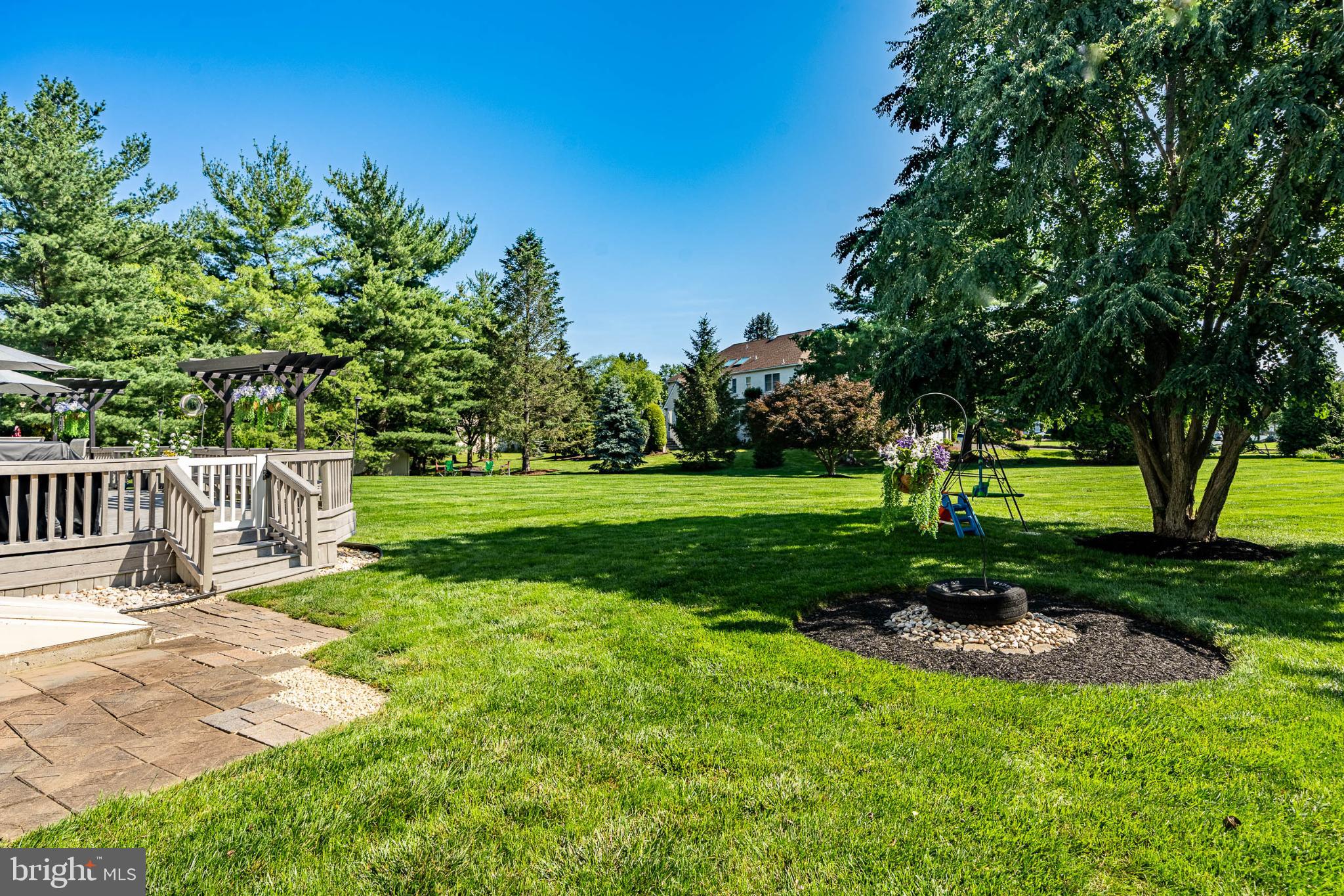 1716 St Georges Road Dresher, PA 19025 - Photo 11 of 90 Spacious backyard oasis with lush greenery.