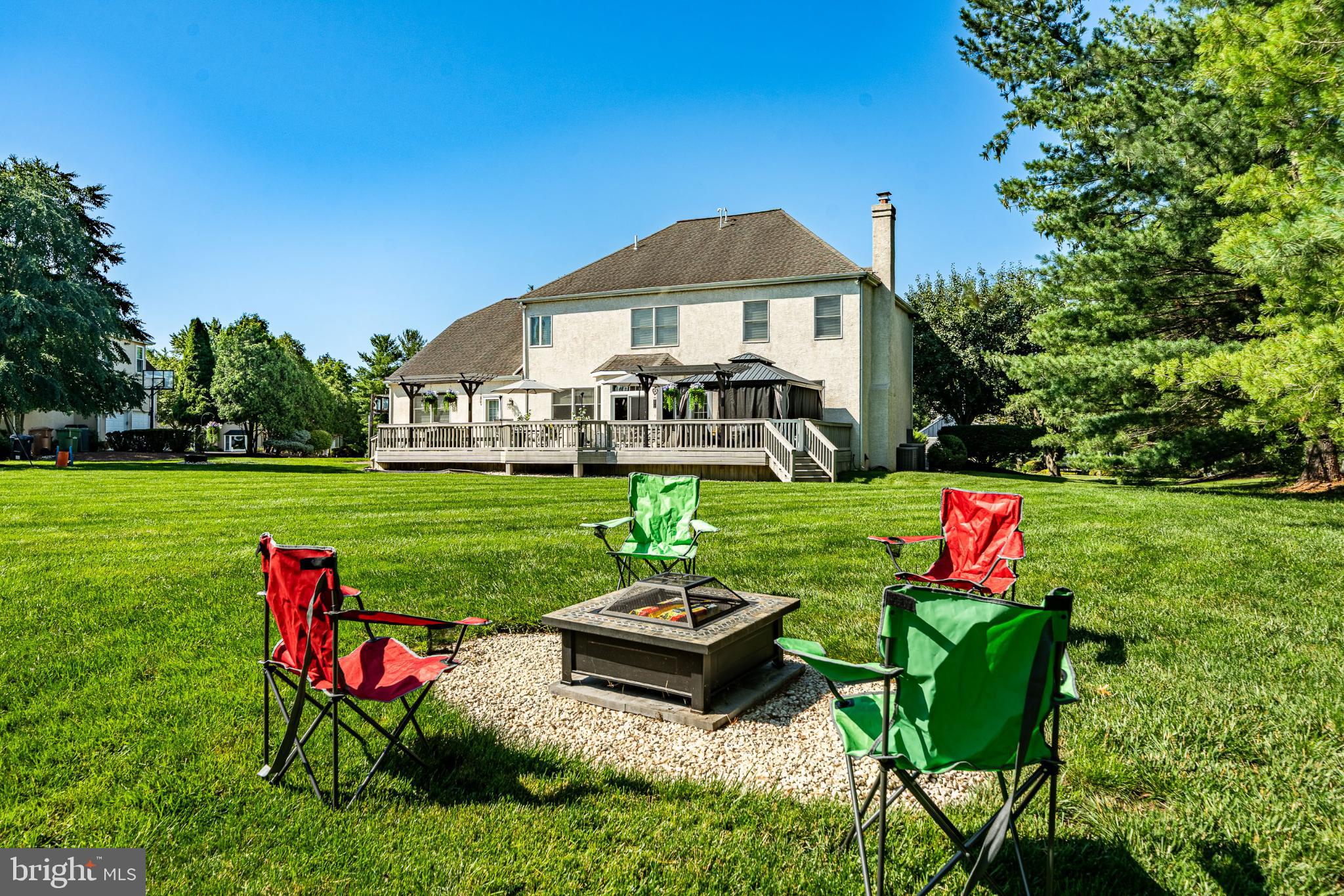 1716 St Georges Road Dresher, PA 19025 - Photo 15 of 90 Inviting backyard retreat with fire pit.