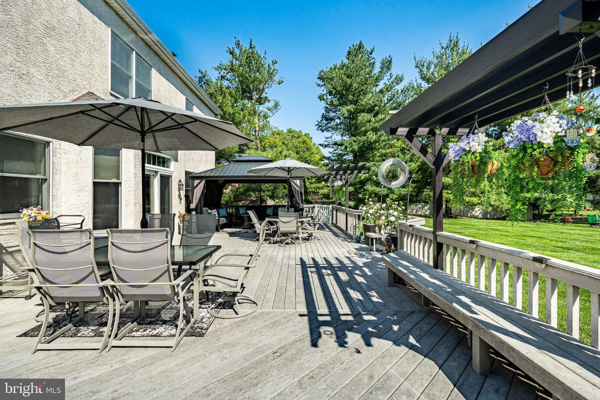 1716 St Georges Road Dresher, PA 19025 - Photo 20 of 90 Sunny deck oasis with lush greenery.