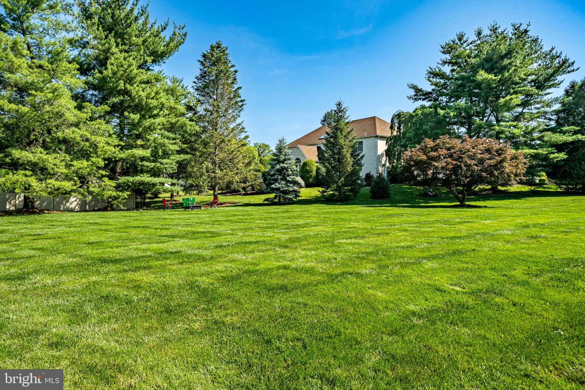 1716 St Georges Road Dresher, PA 19025 - Photo 21 of 90 Lush green oasis with serene landscaping.