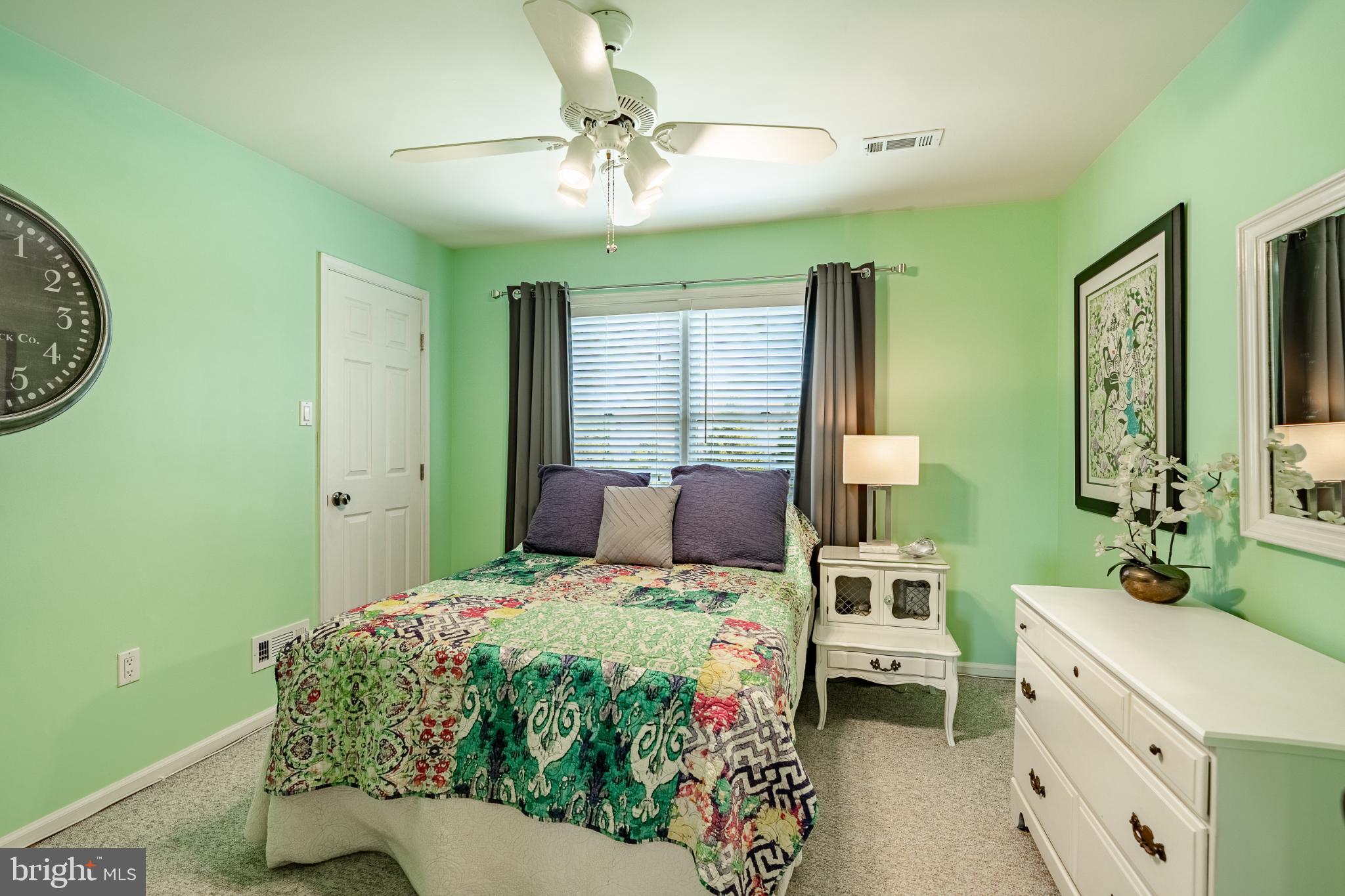 1716 St Georges Road Dresher, PA 19025 - Photo 51 of 90 Charming bedroom with vibrant green walls.