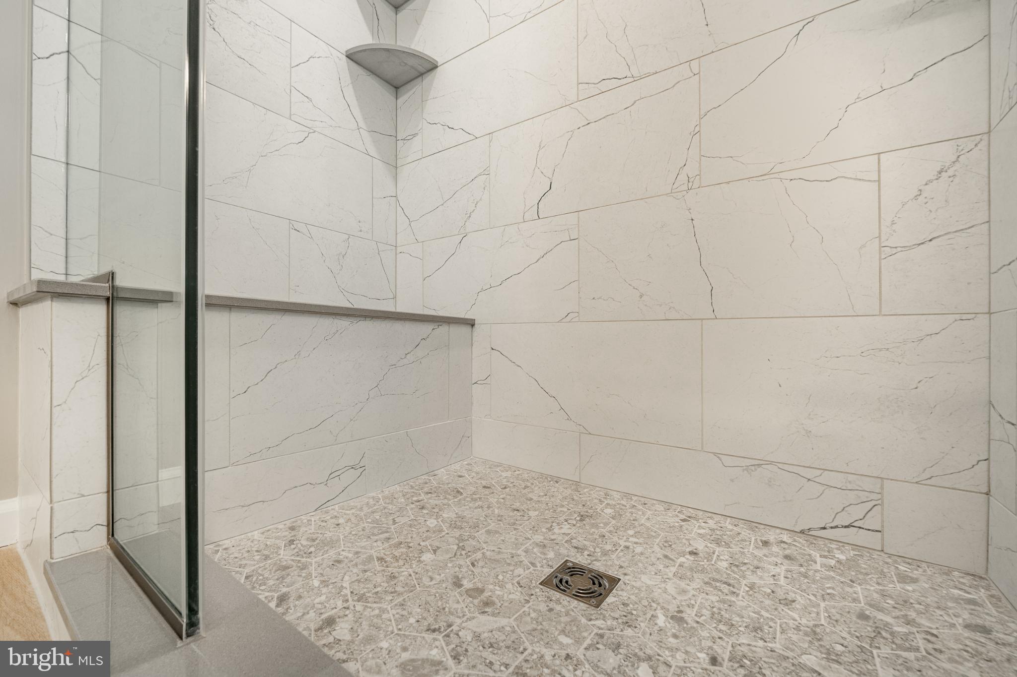1716 St Georges Road Dresher, PA 19025 - Photo 72 of 90 Sleek marble shower with modern elegance.