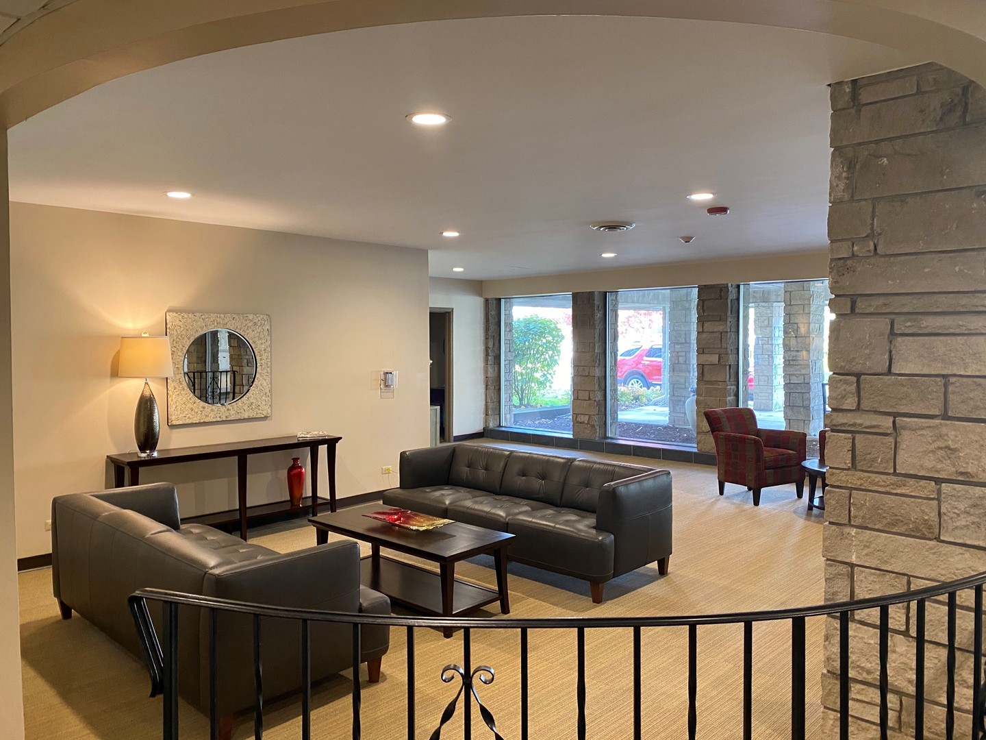 2400 Windsor Mall, Unit 1K Park Ridge, IL 60068 - Photo 10 of 13 a living room with furniture a rug and a window