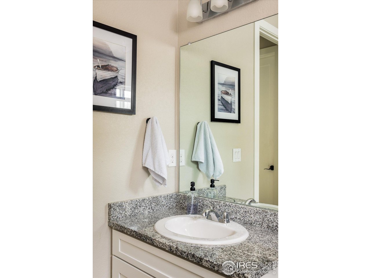 10121 Flower Street Westminster, CO 80021 - Photo 17 of 40 easily accessible main-level 3/4 bath