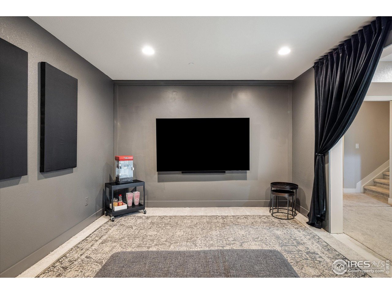 10121 Flower Street Westminster, CO 80021 - Photo 33 of 40 a dedicated theatre room creates the perfect setting for movie nights