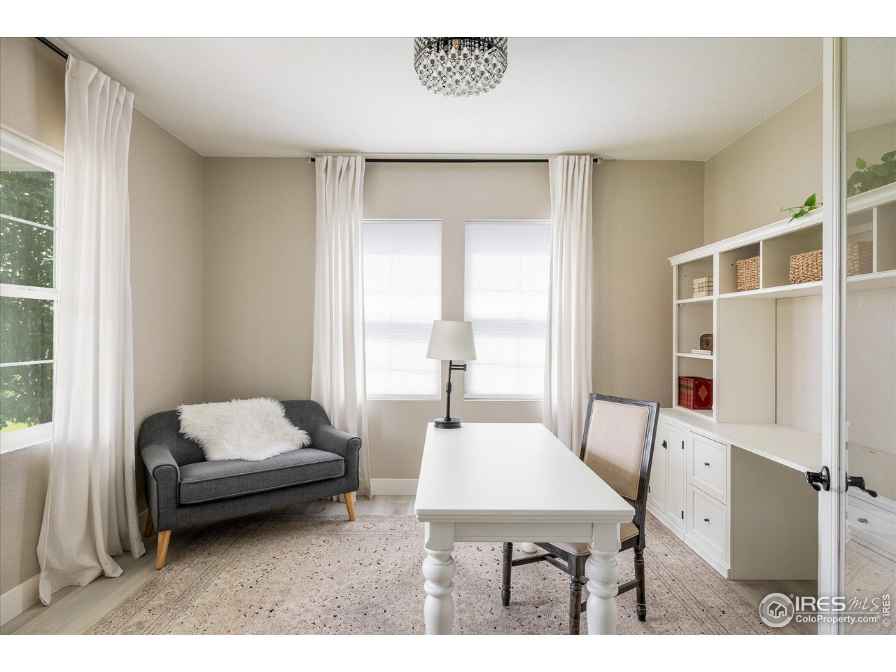 10121 Flower Street Westminster, CO 80021 - Photo 6 of 40 a front-entry office with a picturesque park view