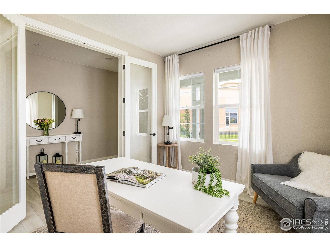 10121 Flower Street Westminster, CO 80021 - Photo 7 of 40 a private office with elegant glass French doors offers the perfect space for work or study