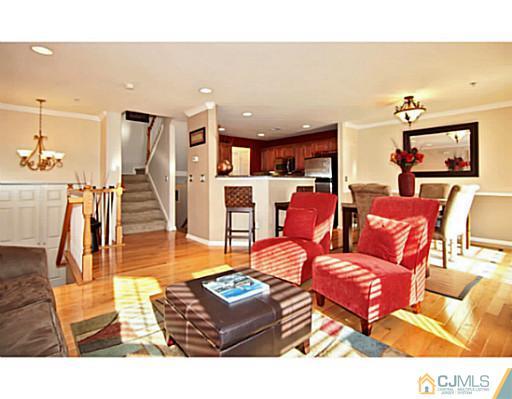 36 Raritan Reach Road South Amboy, NJ 08879 - Photo 5 of 22 a living room with furniture and a view of kitchen