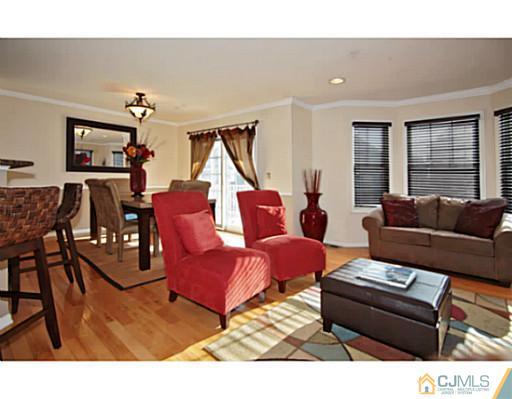 36 Raritan Reach Road South Amboy, NJ 08879 - Photo 7 of 22 a living room with furniture and a wooden floor
