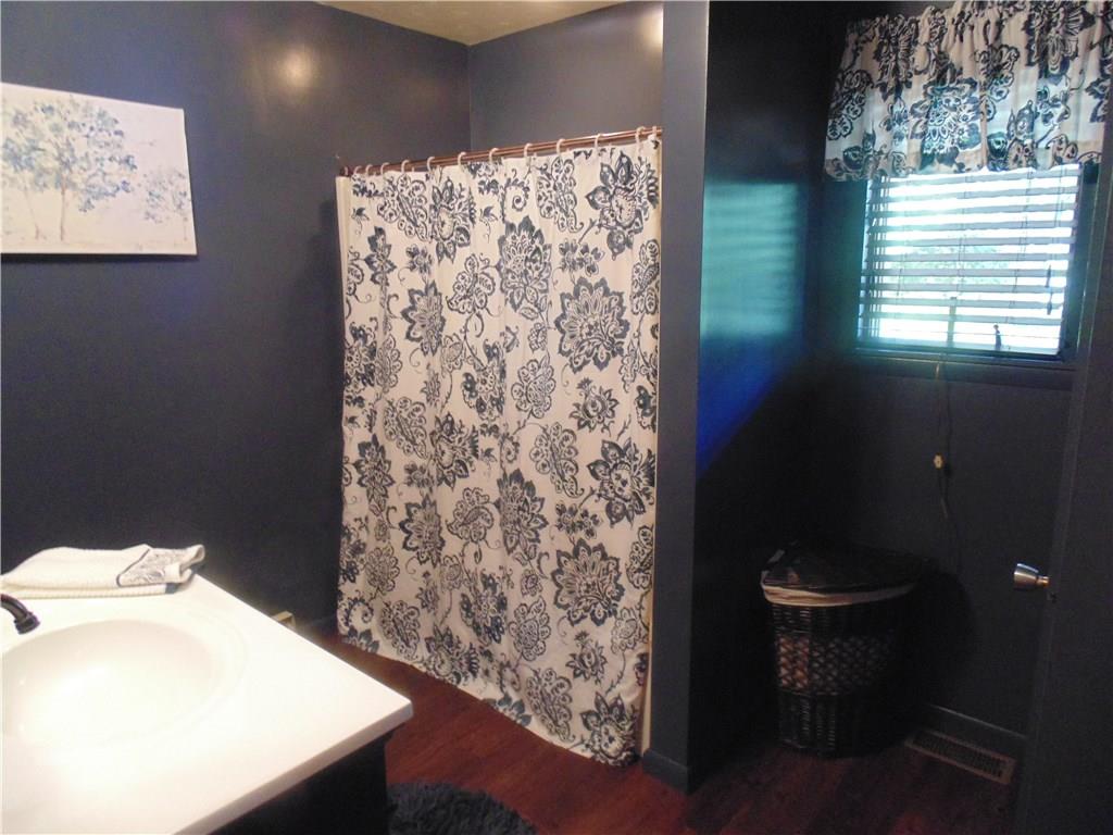 138 Reiber Road Renfrew, PA 16053 - Photo 15 of 20 The main bath in this home has been updated within the last year, and is large enough to accommodate the whole family. In addition, the lower level laundry room has the makings of another potential full bath.