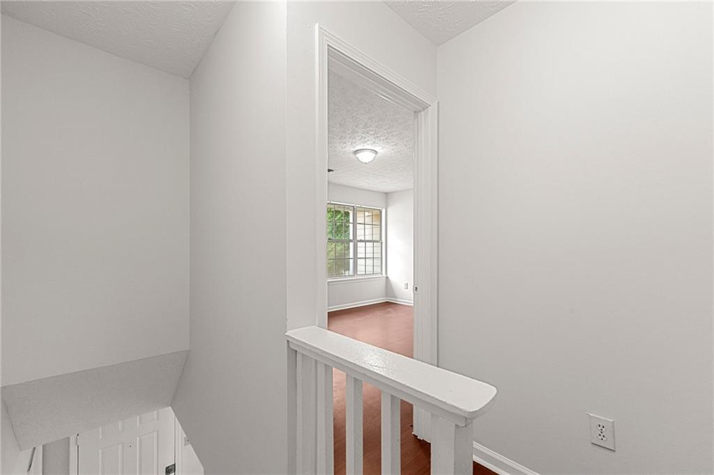 2575 Picardy Circle North, Unit B Atlanta, GA 30349 - Photo 14 of 20 a view of entryway with wooden floor