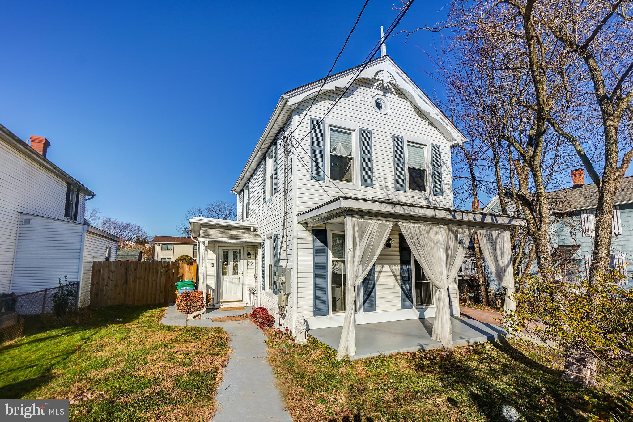35 4th Street Laurel, MD 20707 - Photo 1 of 31 a front view of a house with a yard