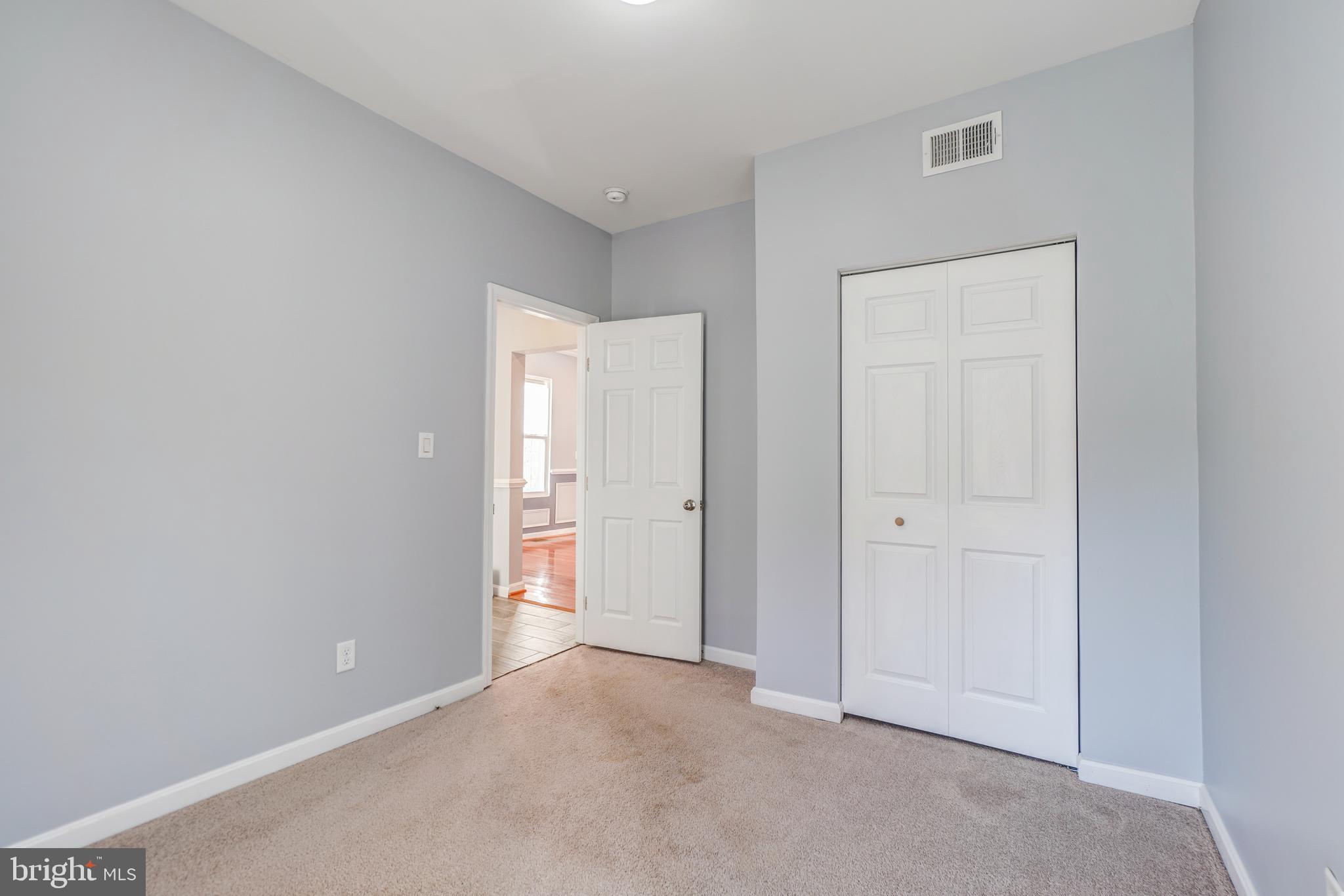 35 4th Street Laurel, MD 20707 - Photo 19 of 31 a view of an empty room and closet area