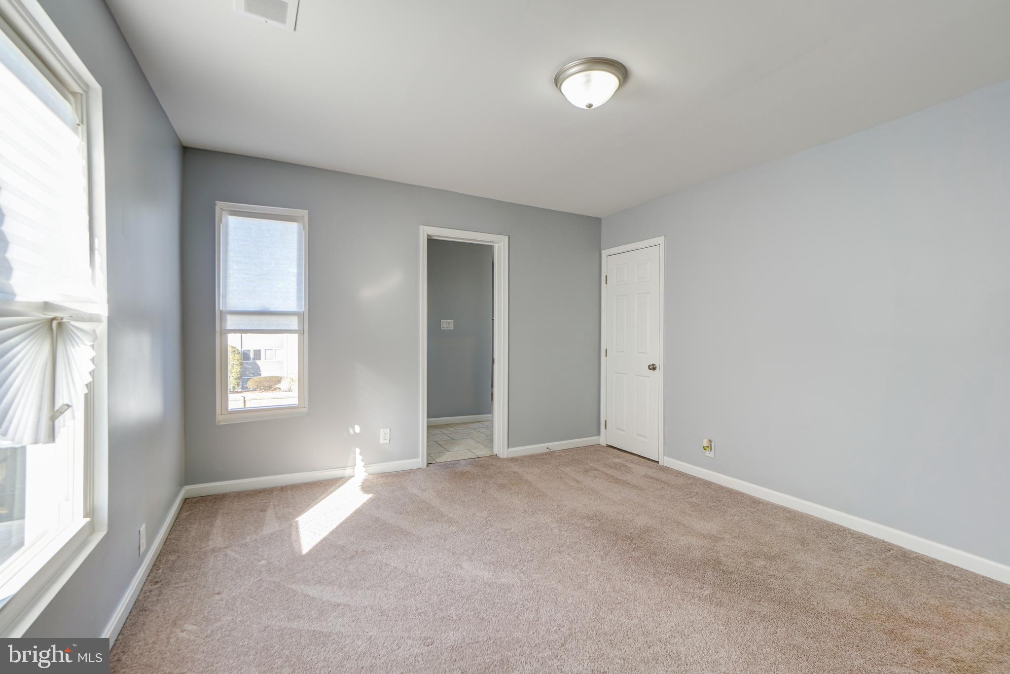 35 4th Street Laurel, MD 20707 - Photo 22 of 31 an empty room with windows