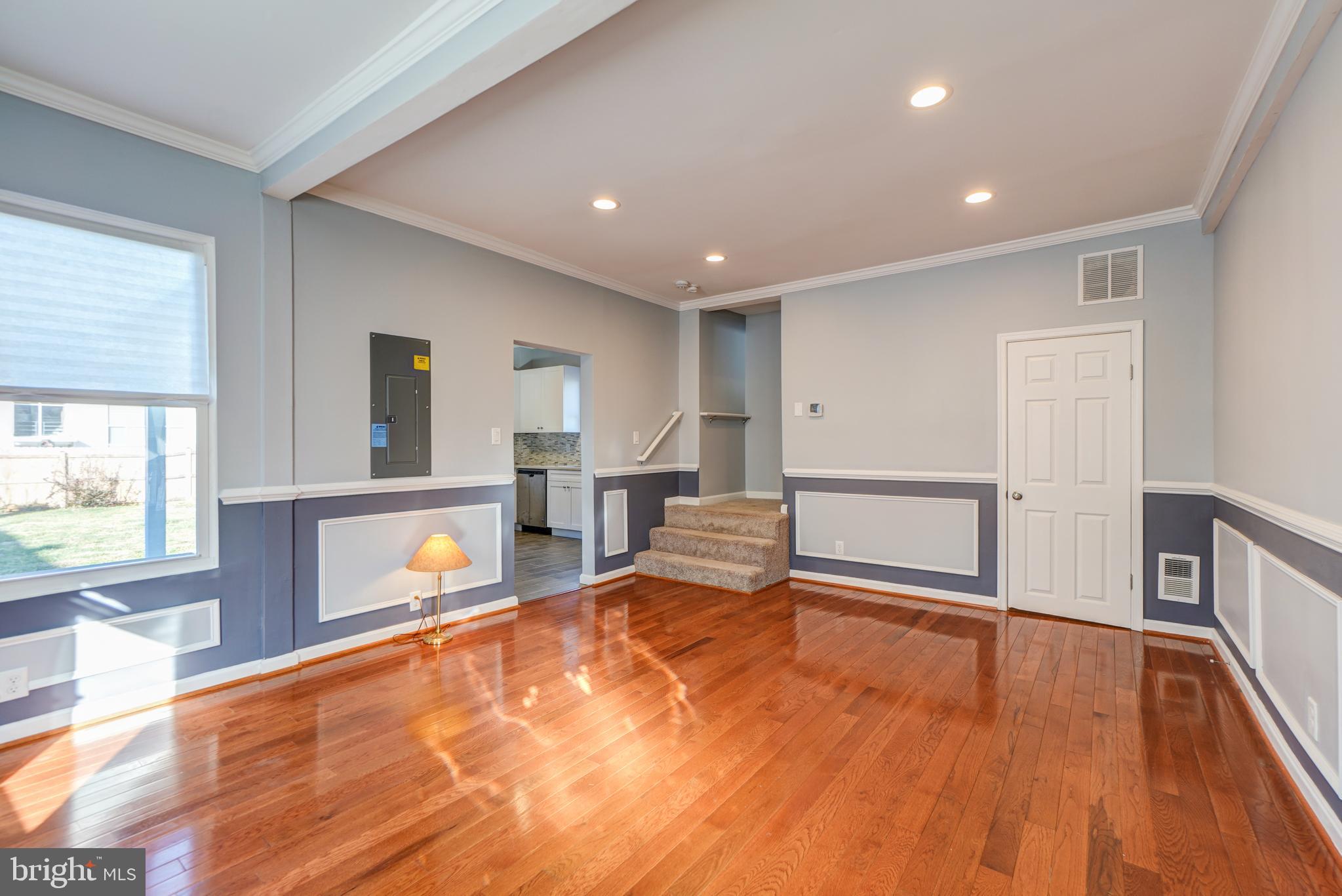 35 4th Street Laurel, MD 20707 - Photo 6 of 31 a living room with furniture and a wooden floor
