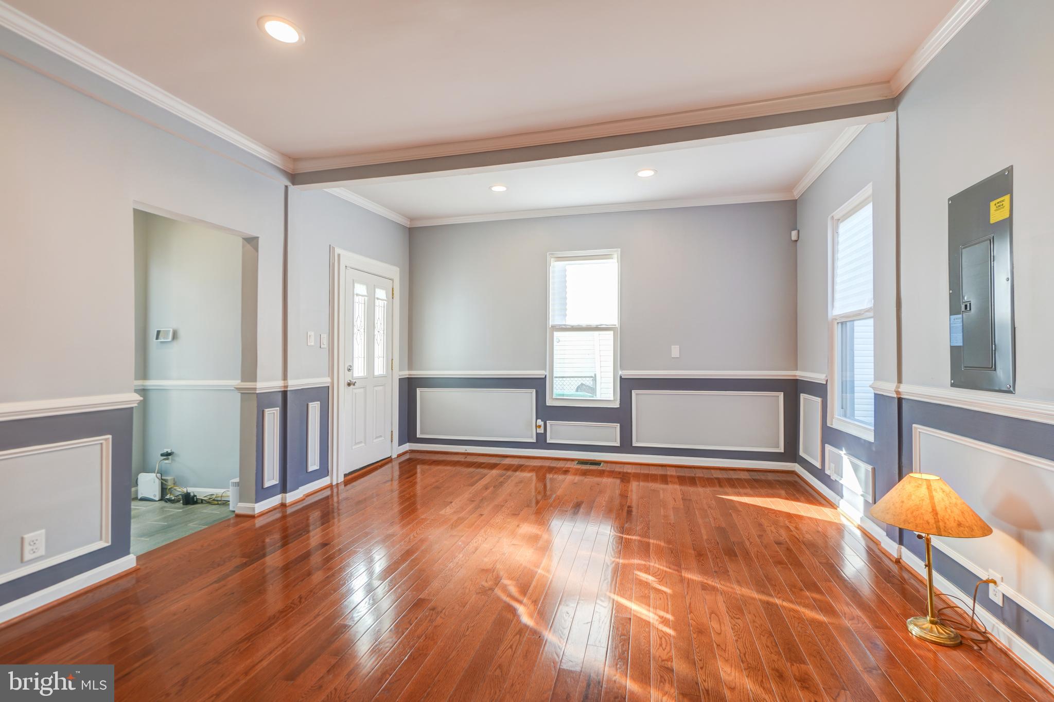 35 4th Street Laurel, MD 20707 - Photo 9 of 31 a view of a room with wooden floor