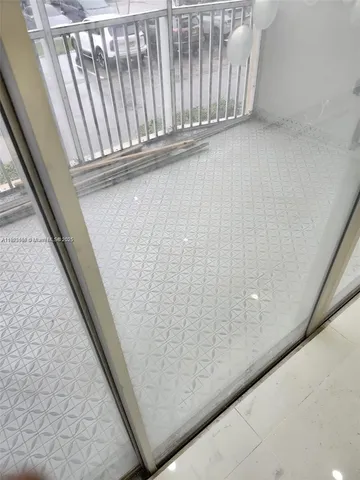 a stove top oven sitting inside of a kitchen