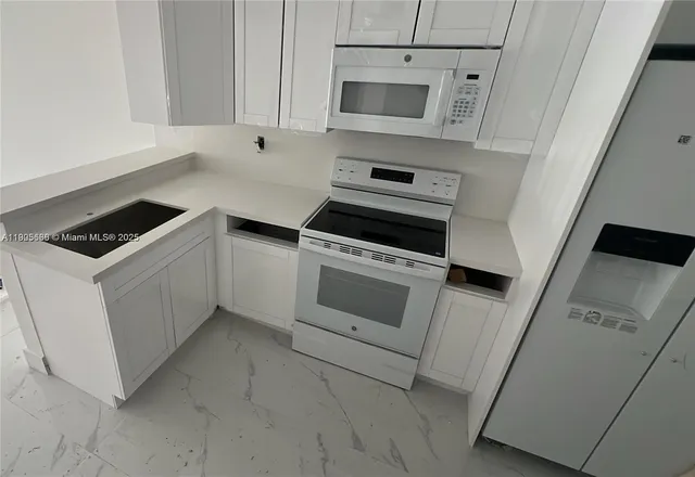 a view of a building with a yard