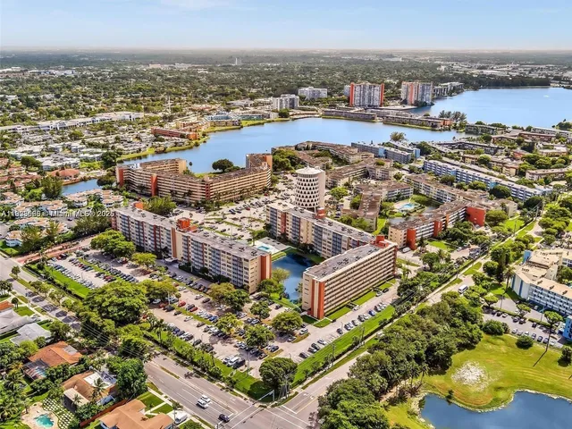 a view of swimming pool with outdoor seating and yard