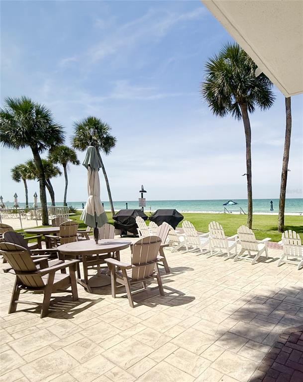 1050 Longboat Club Road, Unit 803 Longboat Key, FL 34228 - Photo 30 of 39 a view of a lounge chairs on the terrace