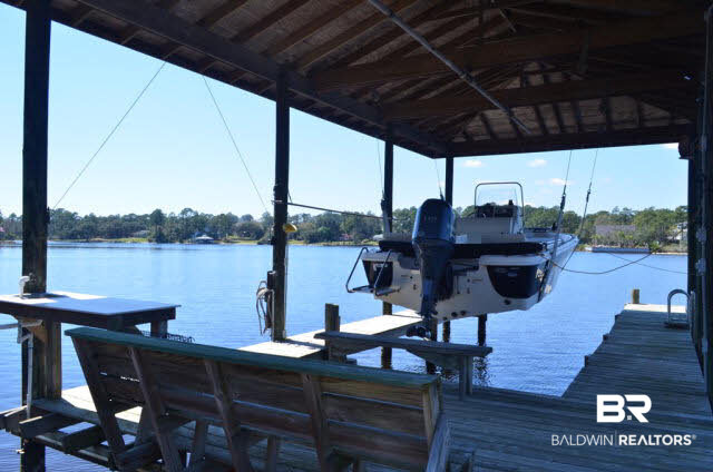 8919 Red Fish Pt Road Lillian, AL 36549 - Photo 33 of 46 Electric lift and fish cleaning station equipped with water.