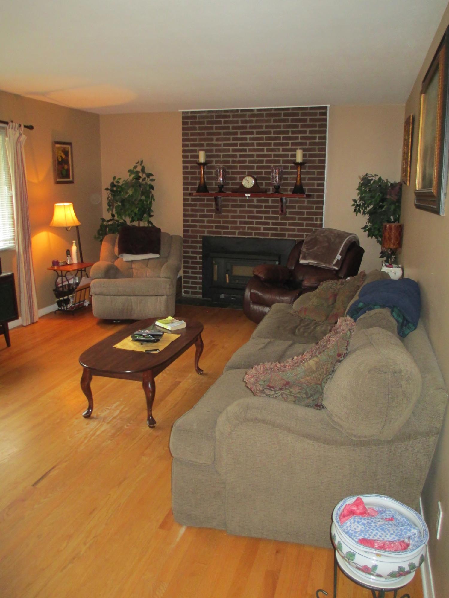 Living Room - Large Window and Fireplace