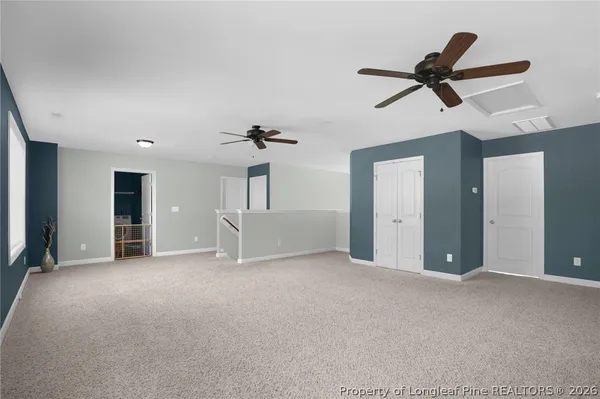 an empty room with a empty space and a window