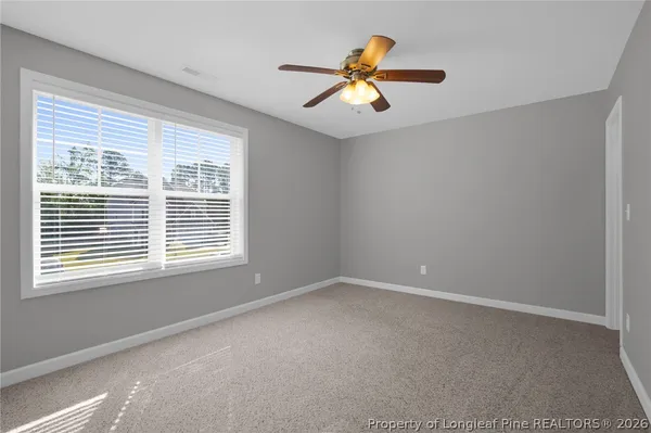 a view of an empty room with window
