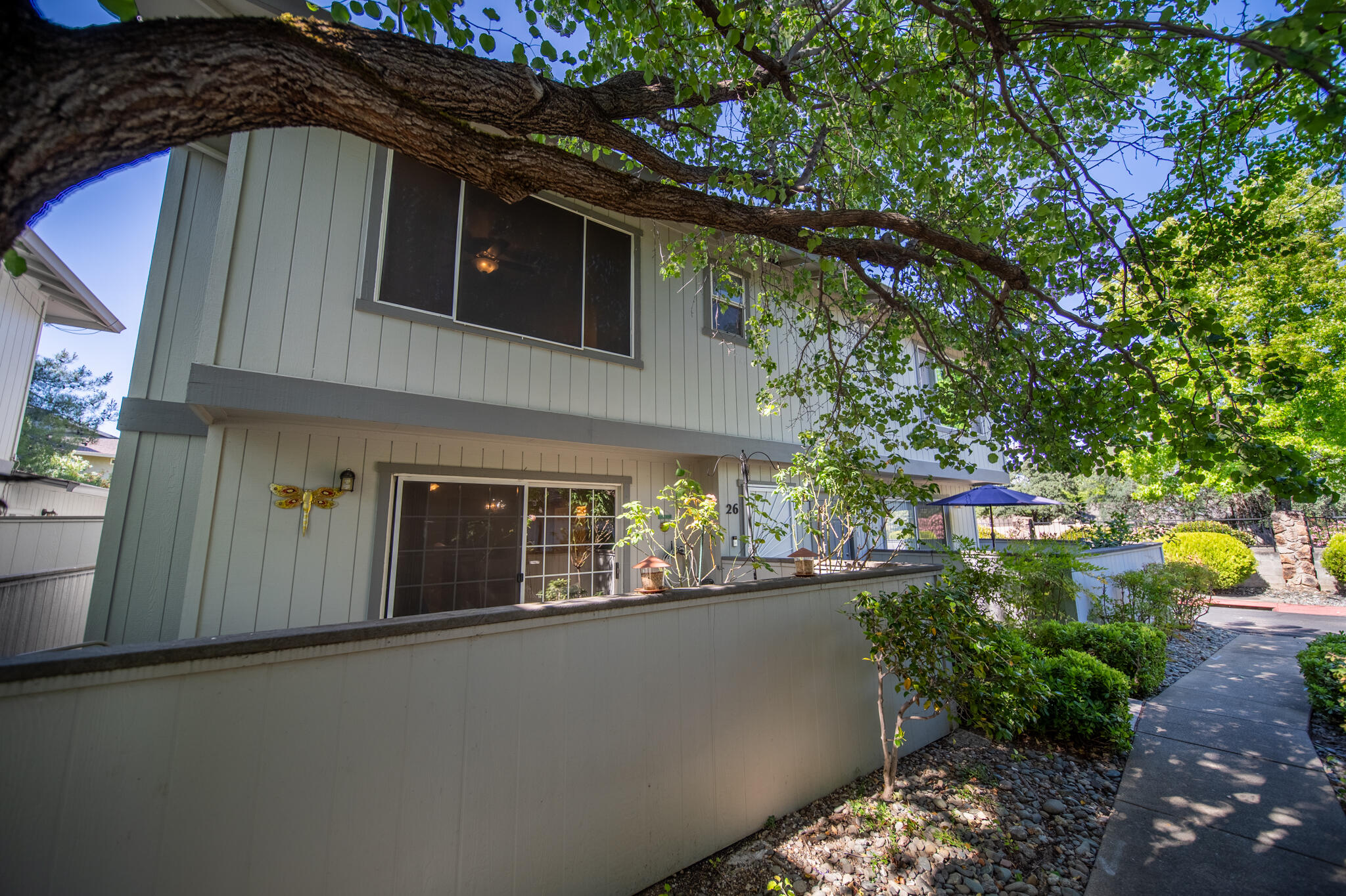 200 Ridgetop Drive, Unit 26 Redding, CA 96003 - Photo 4 of 27 a view of a house with a tree