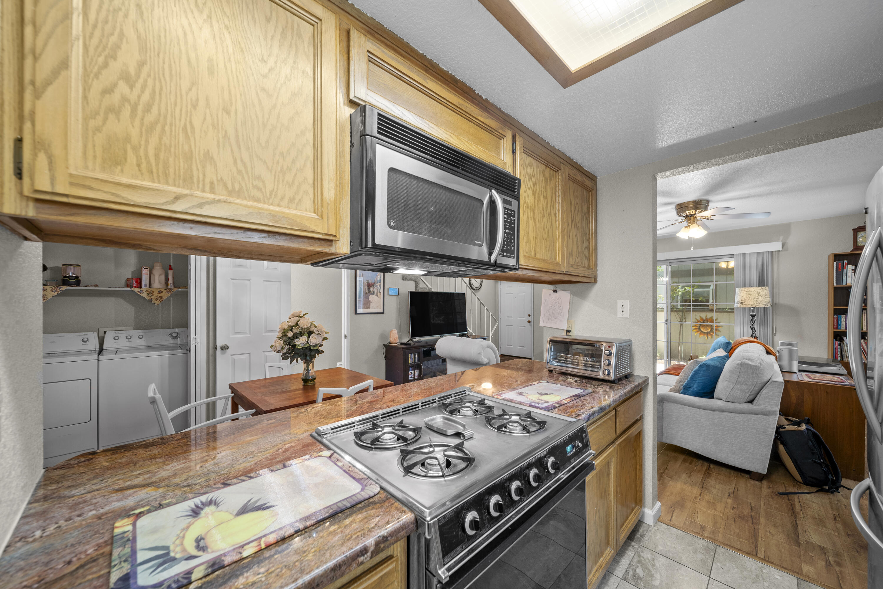 200 Ridgetop Drive, Unit 26 Redding, CA 96003 - Photo 8 of 27 a living room with furniture and a fireplace