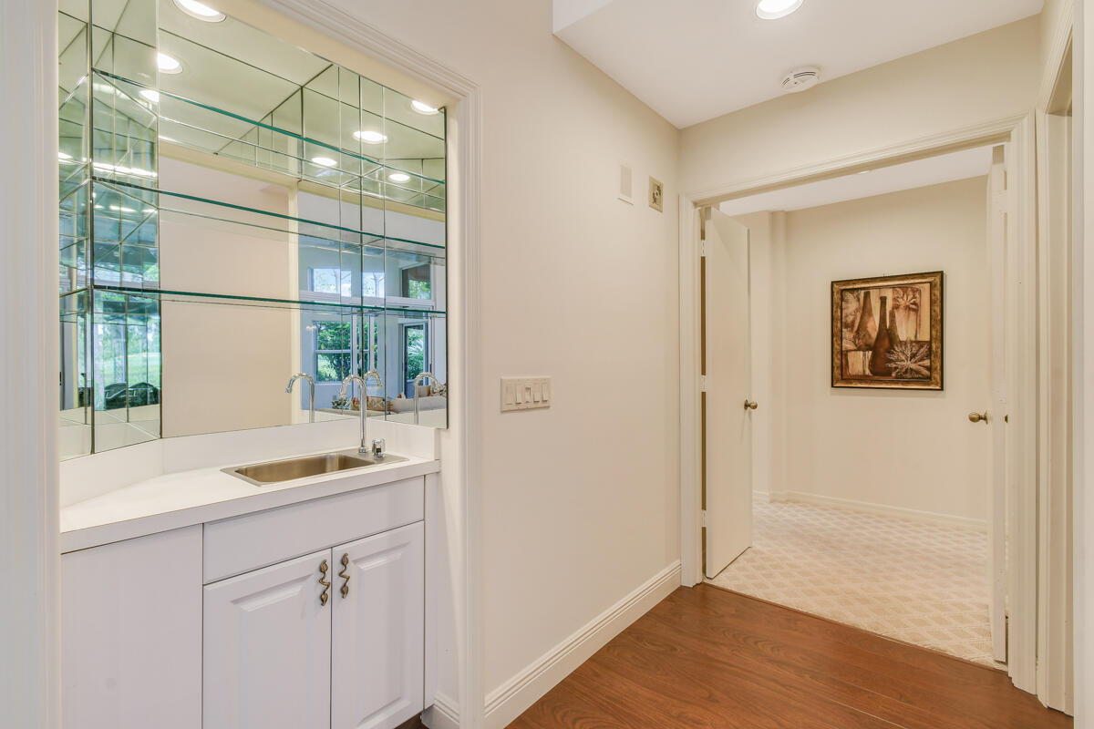 13312 Northwest Maplewood Road Palm City, FL 34990 - Photo 27 of 69 a kitchen with a sink and a window