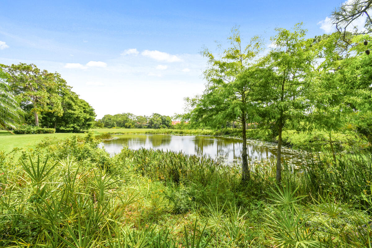 13312 Northwest Maplewood Road Palm City, FL 34990 - Photo 43 of 69 a view of lake