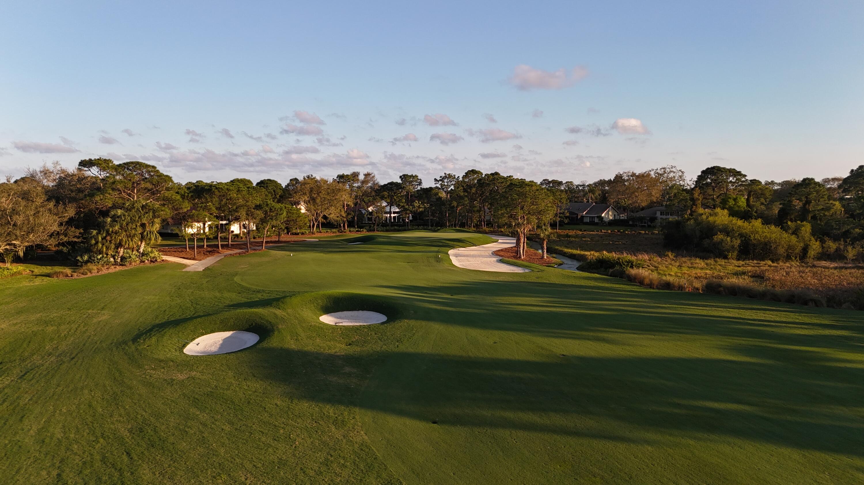 13312 Northwest Maplewood Road Palm City, FL 34990 - Photo 69 of 69 a view of a golf course with a lake