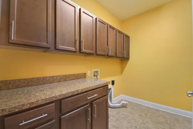 a view of storage area and utility room