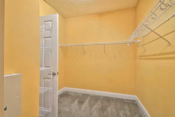 a bathroom with a sink vanity granite tub shower and a mirror