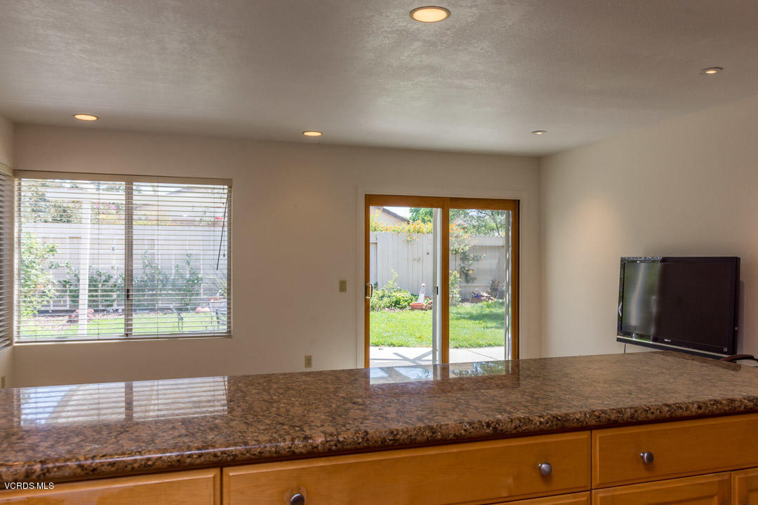 1616 Old Ranch Road Camarillo, CA 93012 - Photo 8 of 9 a kitchen with stainless steel appliances granite countertop a sink and a large window