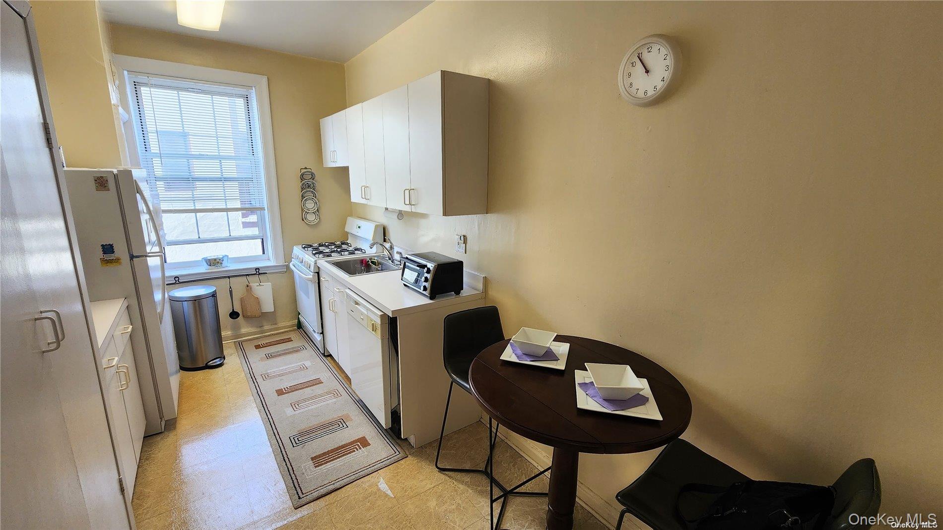 4 Maple Drive, Unit 6H Great Neck, NY 11021 - Photo 5 of 14 a view of a workspace with furniture and a window