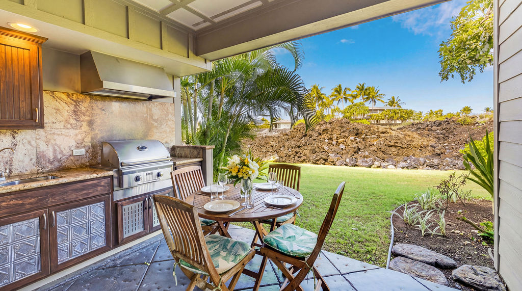 68-1122 Na Ala Hele Road, Unit H2 Kamuela, HI 96743 - Photo 2 of 12 a outdoor dining space with furniture and garden view