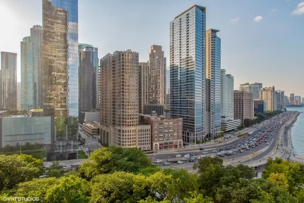 a view of a city with tall buildings