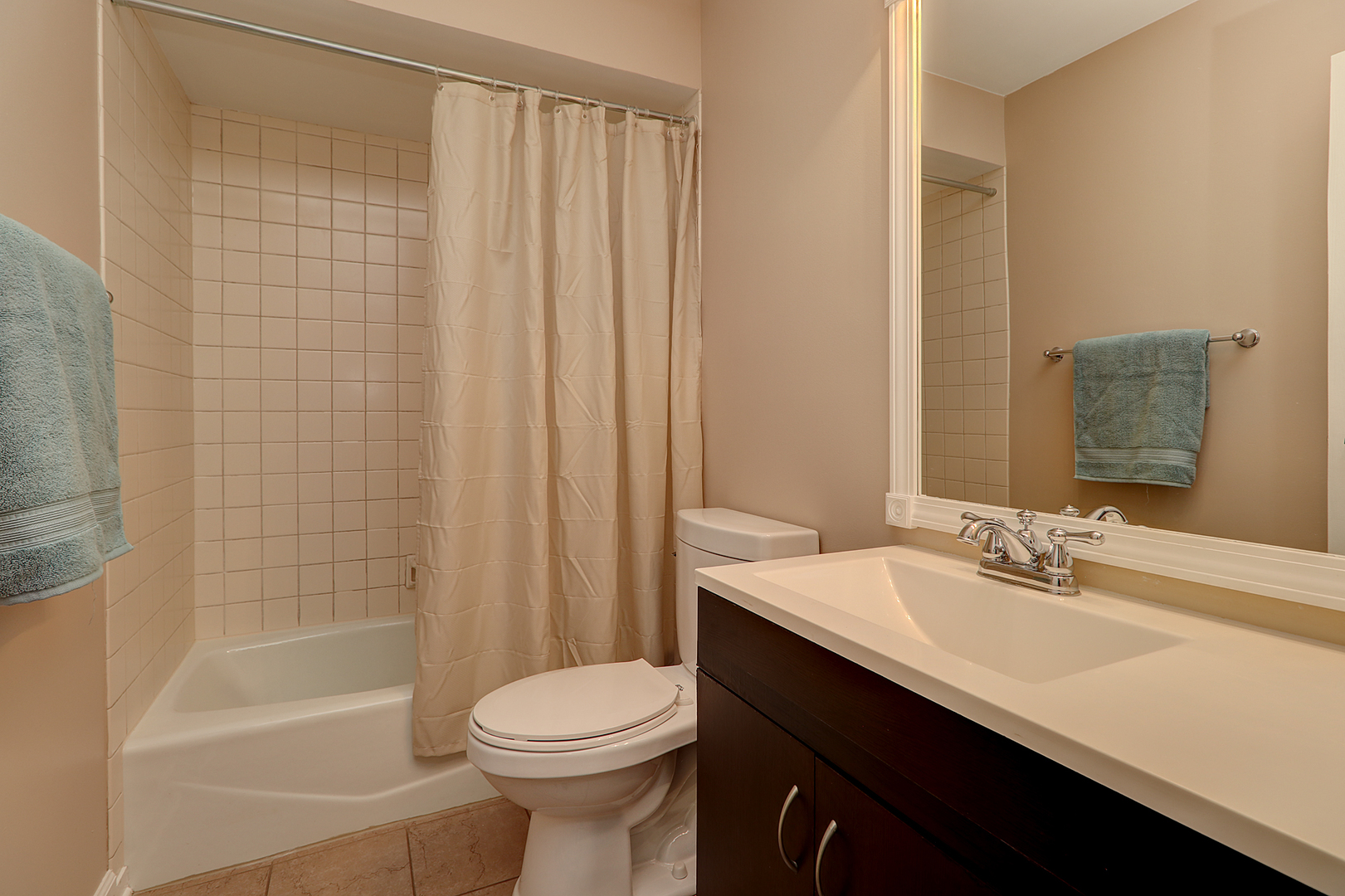 14803 South Penn Road Plainfield, IL 60544 - Photo 14 of 17 a bathroom with a sink a toilet and shower