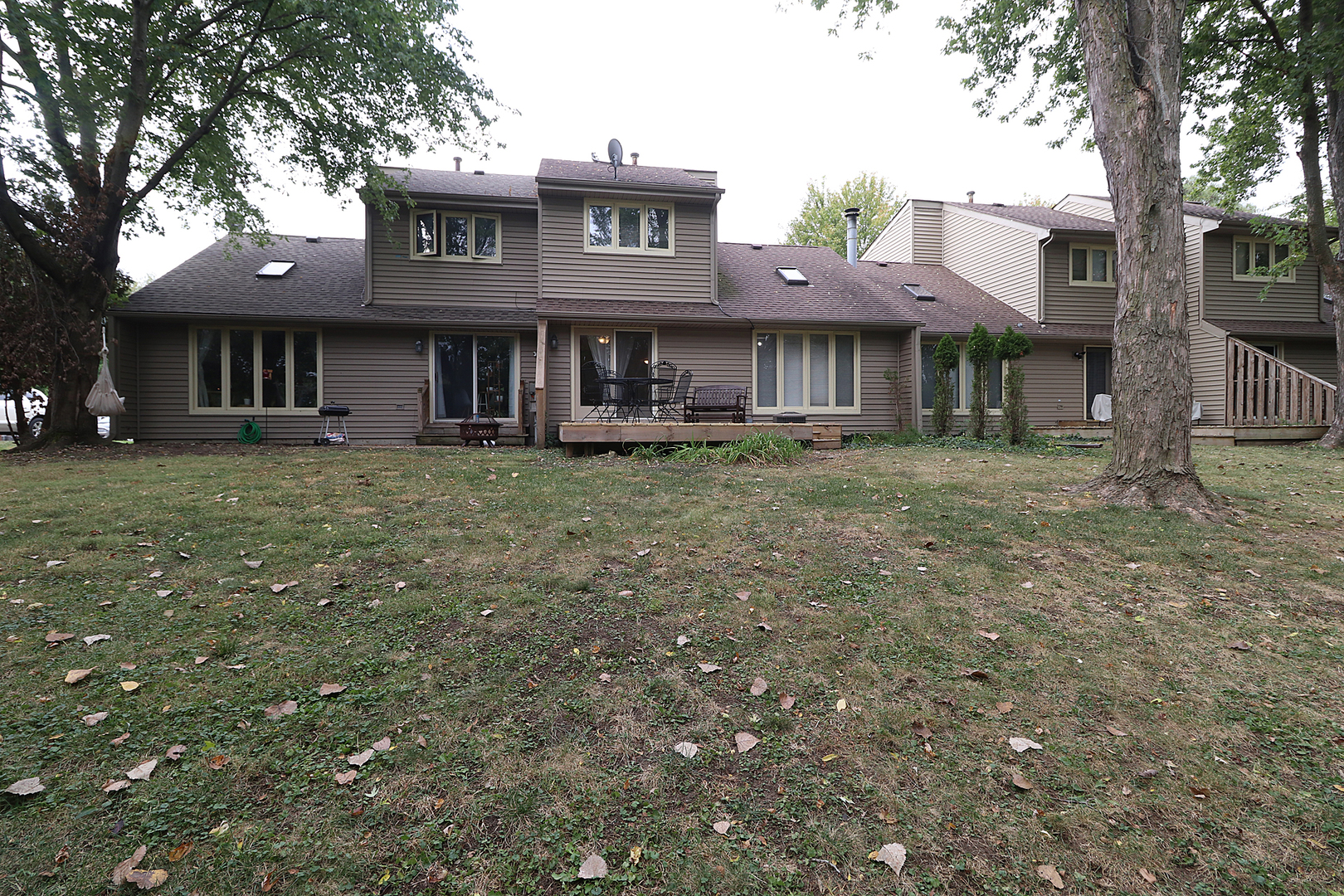 14803 South Penn Road Plainfield, IL 60544 - Photo 15 of 17 a view of a house with a yard